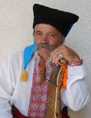 Senior ukrainian folk Kobzar with bandura