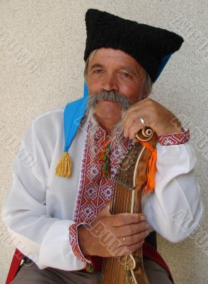 Senior ukrainian folk Kobzar with bandura