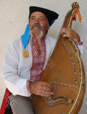 Senior ukrainian folk Kobzar with bandura