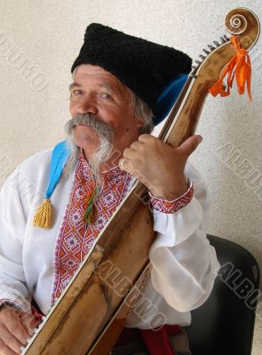 Senior ukrainian folk Kobzar with bandura