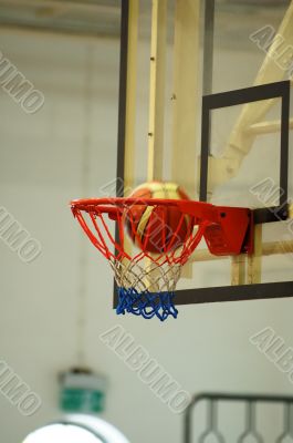 Basketball swishing through the hoop