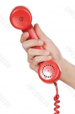hand holding red telephone