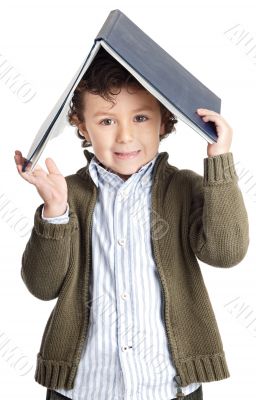adorable boy reading a book