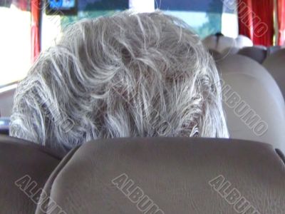 traveler pensioner white hair closeup