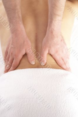 gentle massage of the lower back
