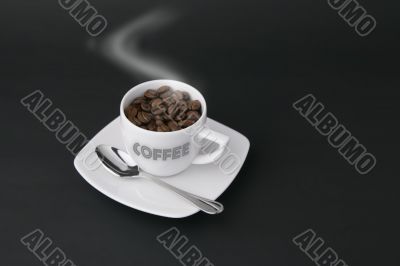 steaming coffee cup with writing