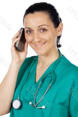 Attractive Lady Doctor speaking on the telephone