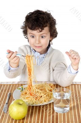 Adorable child hungry at the time of eating