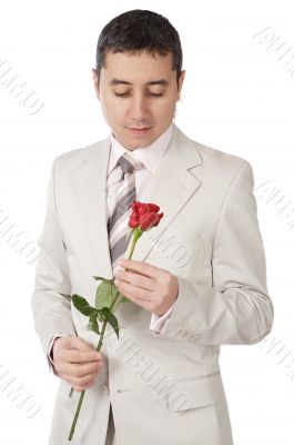 young person enamored with a rose