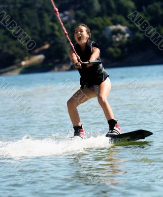 Girl wakeboarding
