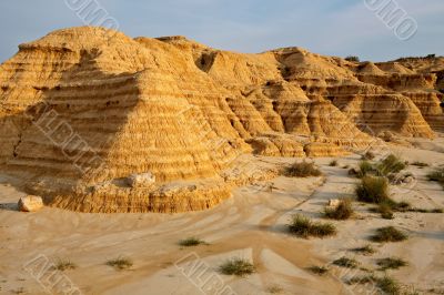 Arid earth over the blue sky