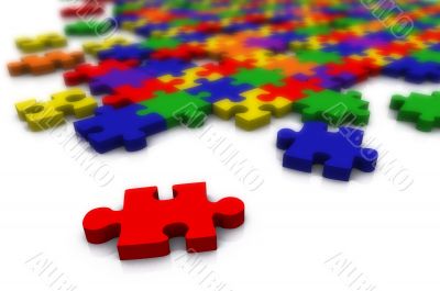 colour puzzle - only red piece in focus