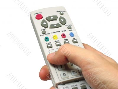 Hand holding a remote