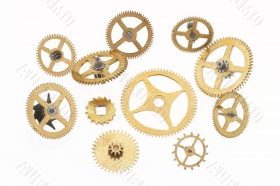 eleven old gold-coloured little cogwheels