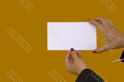 Hands showing a blank card