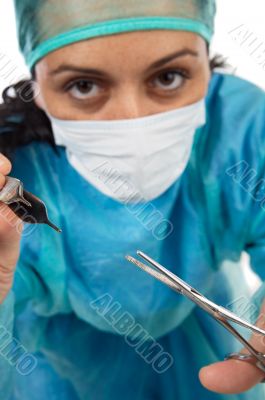 woman doctor operating