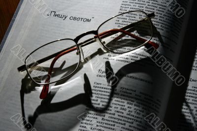 spectacles and book spectacles and book