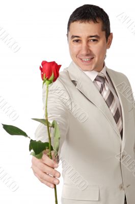 Attractive young man giving a love gift