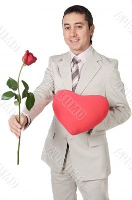 Attractive young man giving a love gift