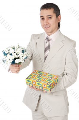 Attractive young man giving a love gift