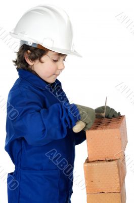 adorable future builder constructing a brick wall