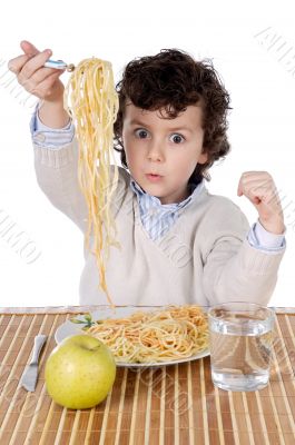 Adorable child hungry at the time of eating