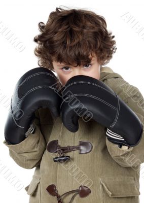 adorable boy with boxing gloves