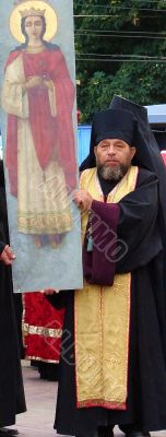 Ukranian Orthodox monk with banner