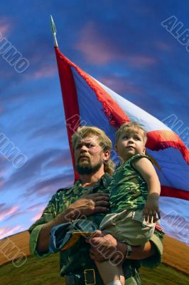 Ukrainian kozak father and son under troop flag