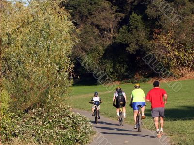 Family riding bikes