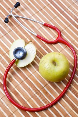 stethoscope and apple