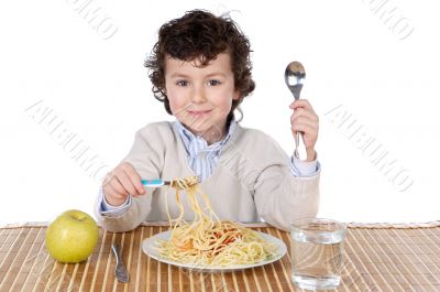 Adorable child hungry at the time of eating