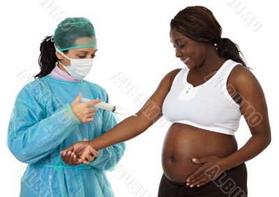 Doctor examining a pregnant woman