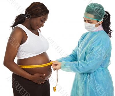 Doctor examining a pregnant woman