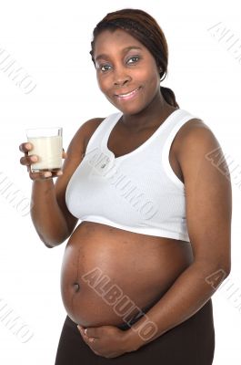 Attractive pregnant woman drinking milk Attractive pregnant woman drinking milk