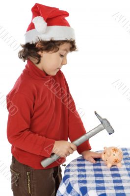 adorable boy breaking the money box