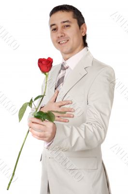 Attractive young man giving a love gift