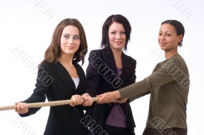 businesswomen pulling together