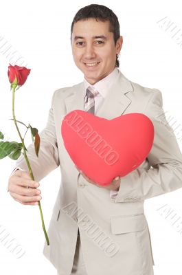 Attractive young man giving a love gift