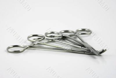 Hemostats and clamps