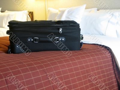 luggage in hotel room
