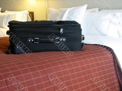 luggage in hotel room