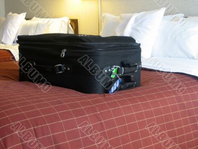 luggage in hotel room