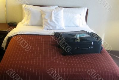 luggage in hotel room