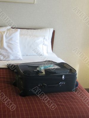 luggage in hotel room