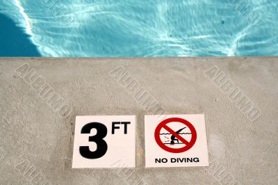 Swimming pool depth marker