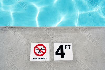 Swimming pool depth marker