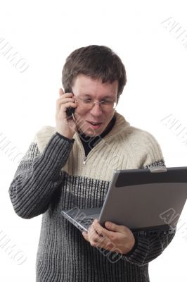 Man with laptop and phone