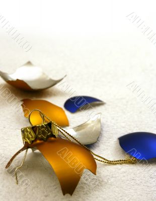 broken golden and blue balls