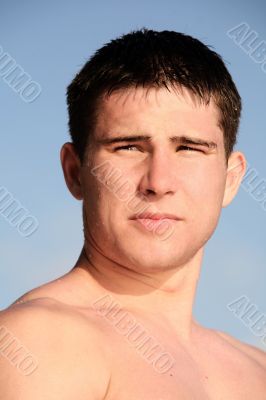 Young man on the beach